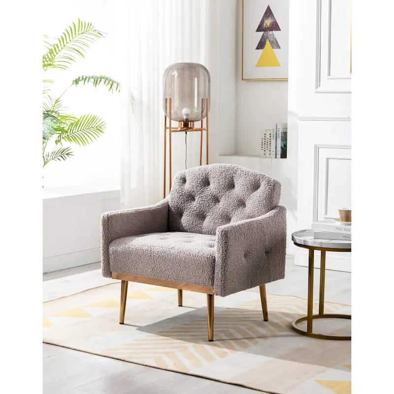 Poltrona accent tufted imbottita in tessuto Teddy con piedini color oro rosa