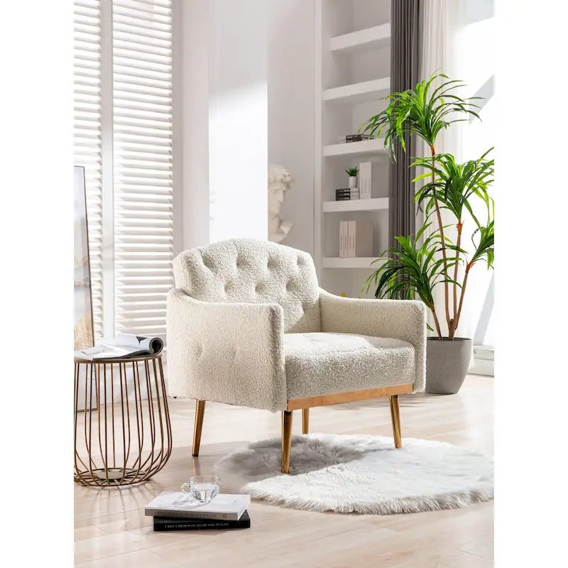 Poltrona accent tufted imbottita in tessuto Teddy con piedini color oro rosa