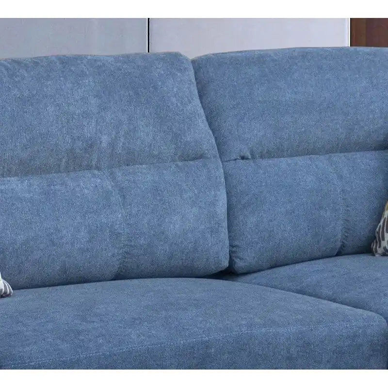 Divano sezionale in tessuto Diego 103.5 con chaise longue a destra, pouf contenitore e 2 cuscini decorativi